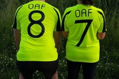 Phil and Amanda sporting their OAF tops