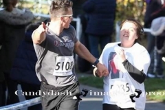 Dan urges Chloe to the finish line of the Hadleigh 5 miler