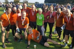 The 19 strong DNA PT team all dirtied up